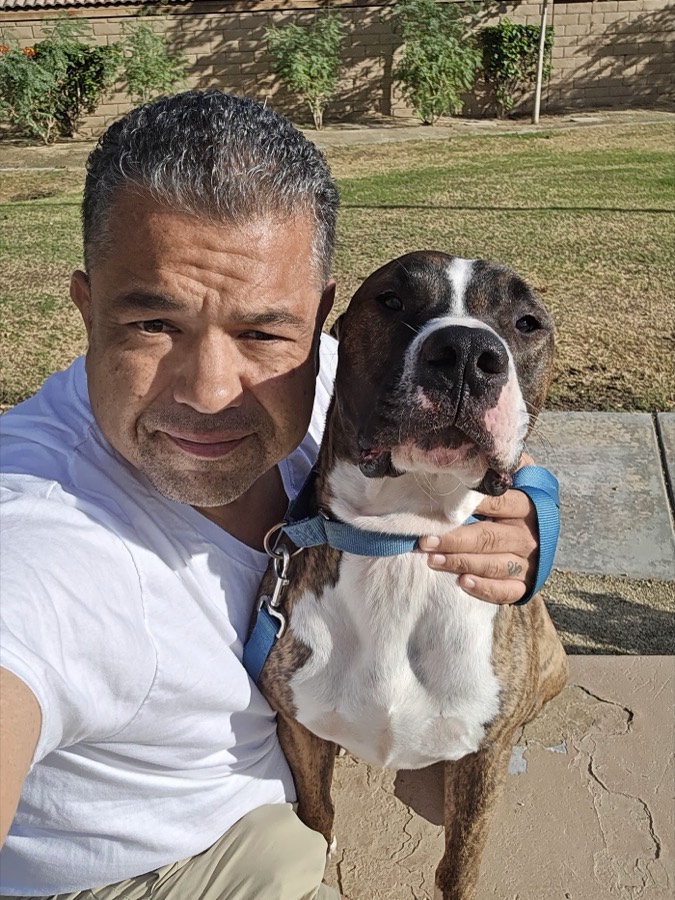 Legacy Healing Foundation team and volunteers with a rescued dog